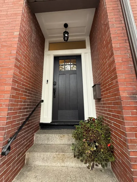 Kurt after window installation - Boston Doors and Windows