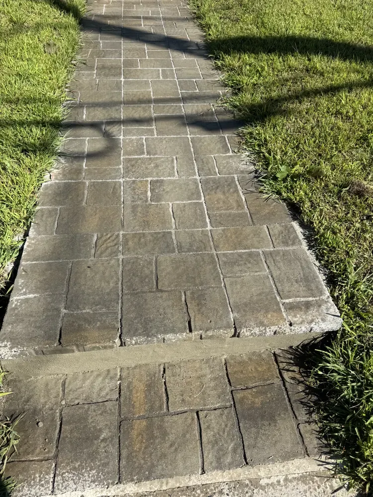 Existing walkway surface before restoration