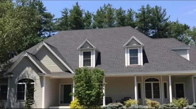 Gray metal roof on a house under construction.
