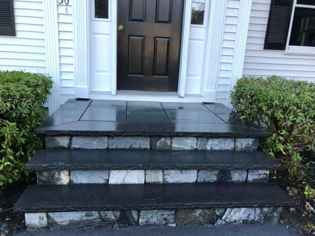 Black granite steps, granite block risers