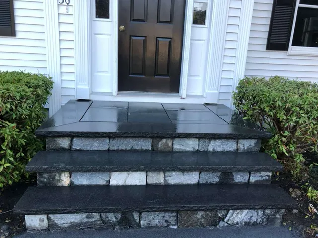Black granite steps, granite block risers