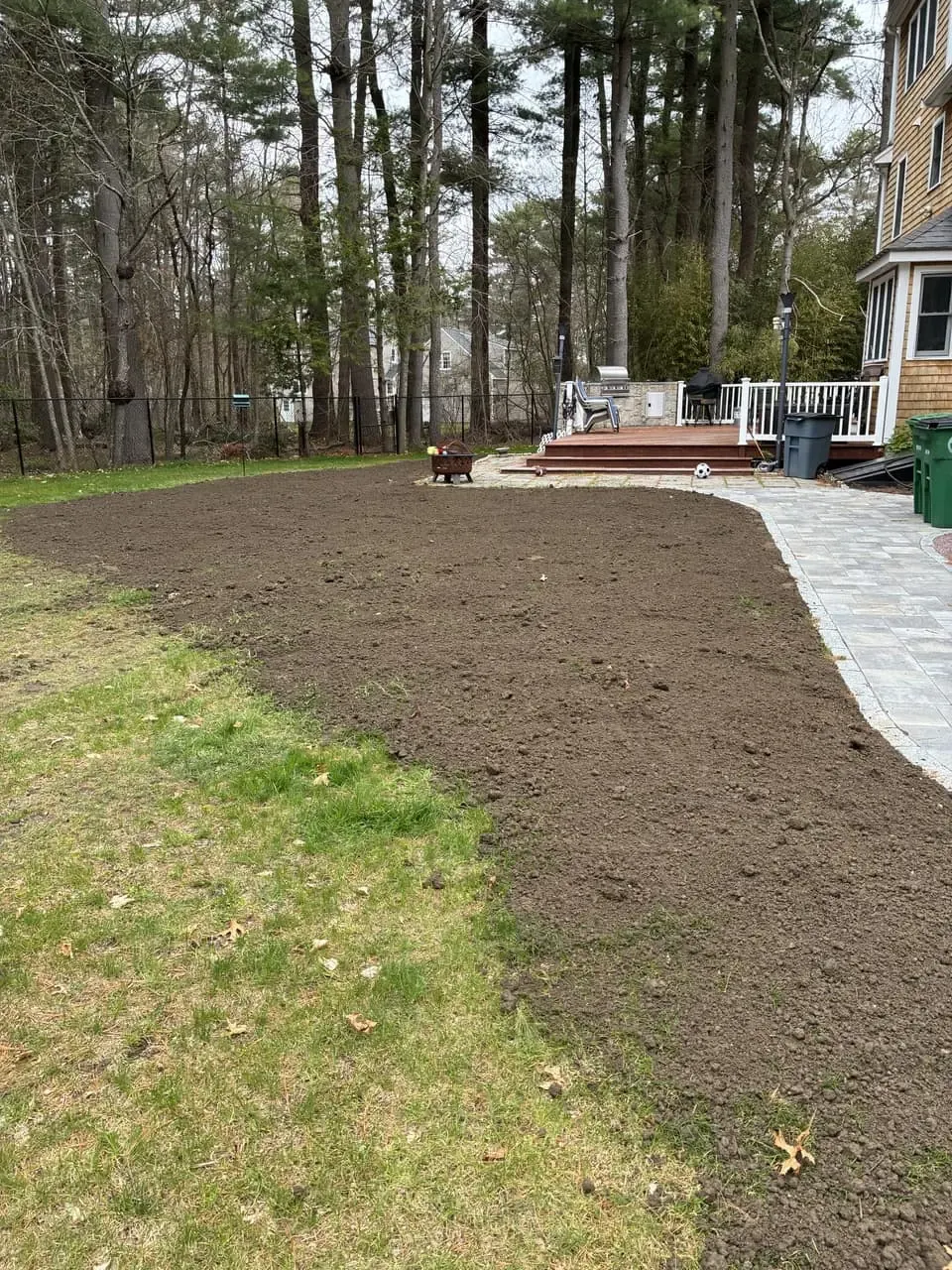 Legacy Excavation is an excavation company that provides lawn restoration with loam and seed