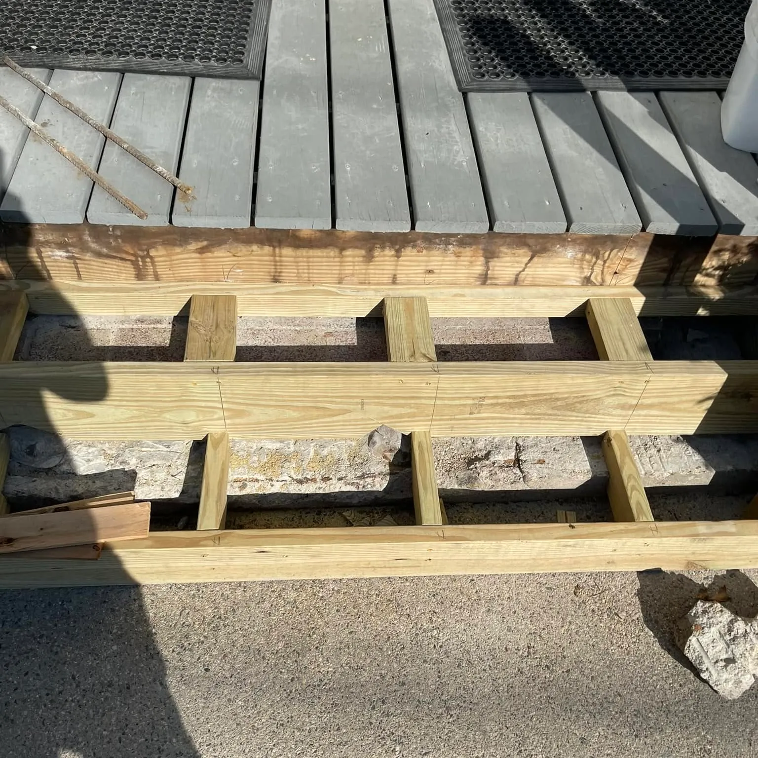 Rebuilt porch framing and decking