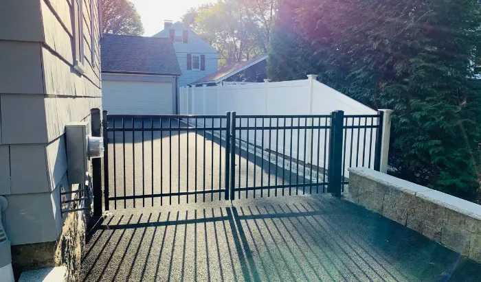 Backyard fence installation by New England Pro Fence serving homeowners across Massachusetts and New Hampshire