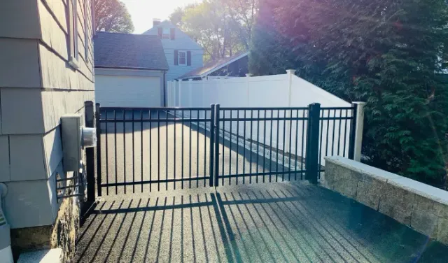 Backyard fence installation by New England Pro Fence serving homeowners across Massachusetts and New Hampshire