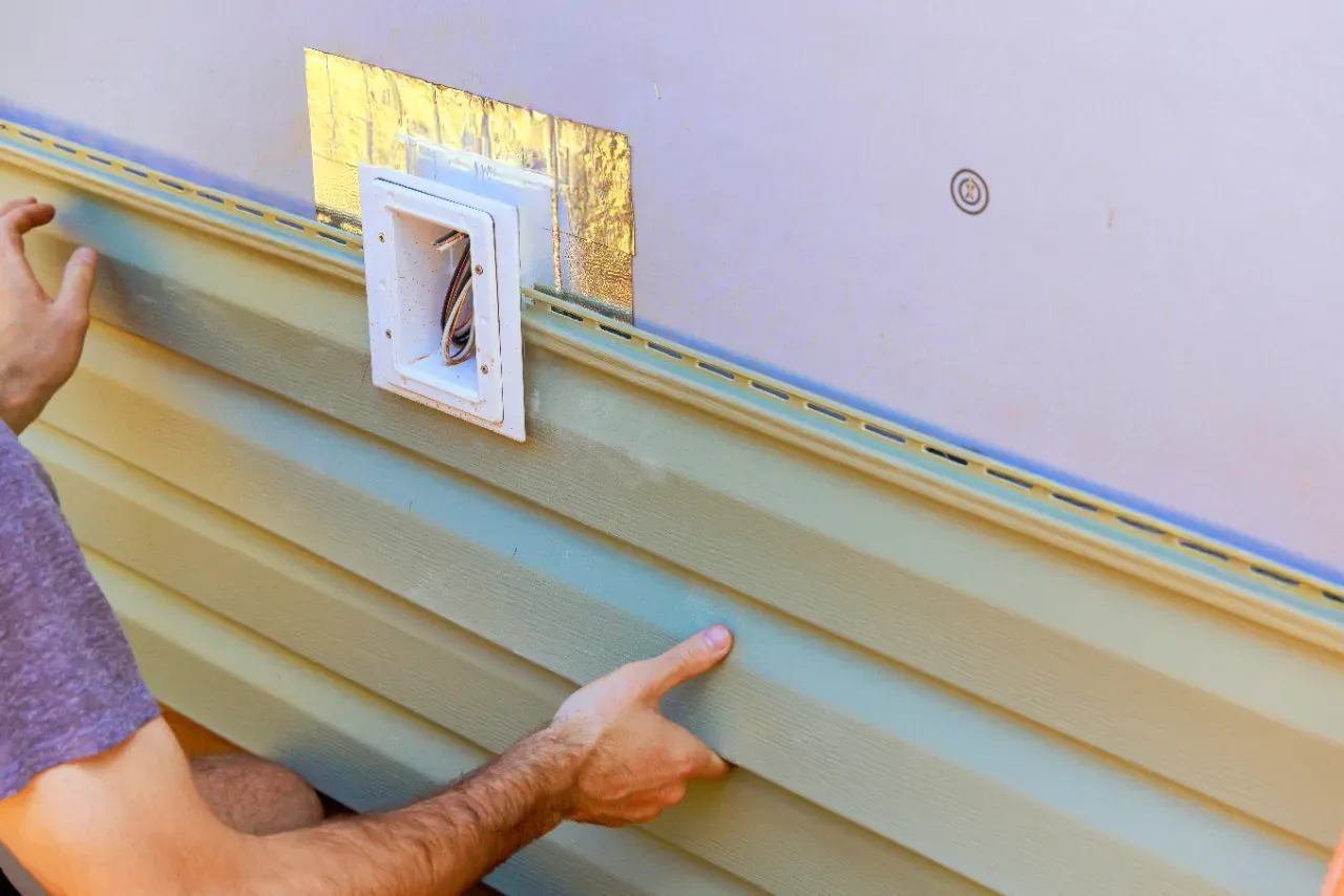 Siding installation on Massachusetts home