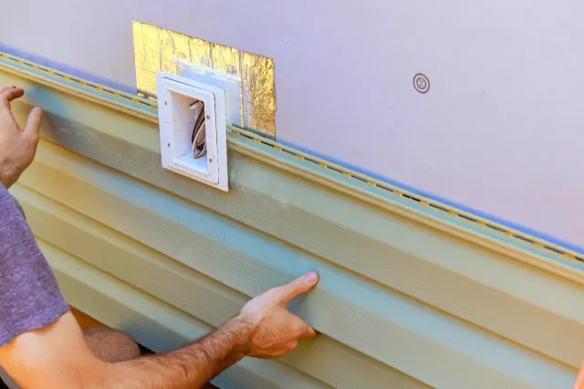 Siding installation on Massachusetts home