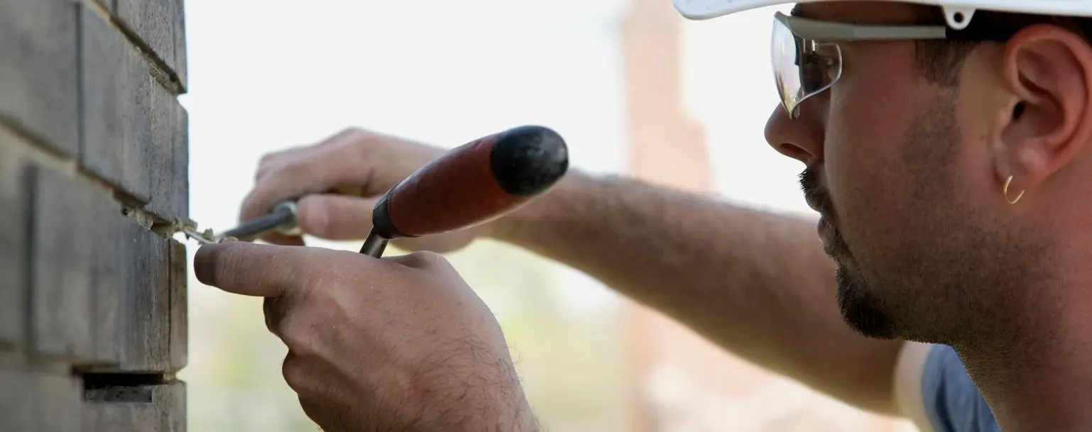 Brick tuck pointing