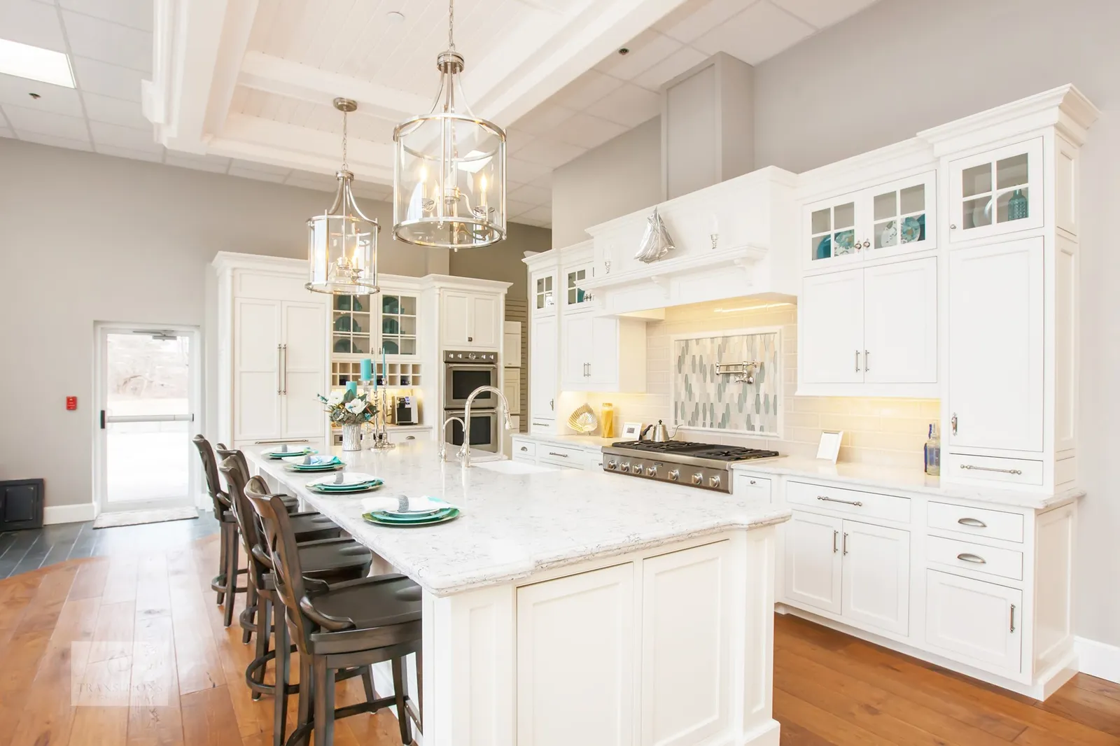 Transitions Kitchens and Baths showroom in Norwell MA featuring full-scale kitchen and bath displays