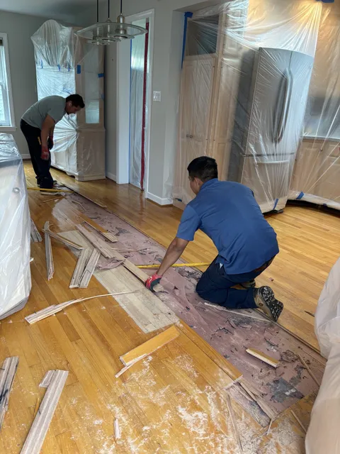 A PCRS technician removing water-damaged materials