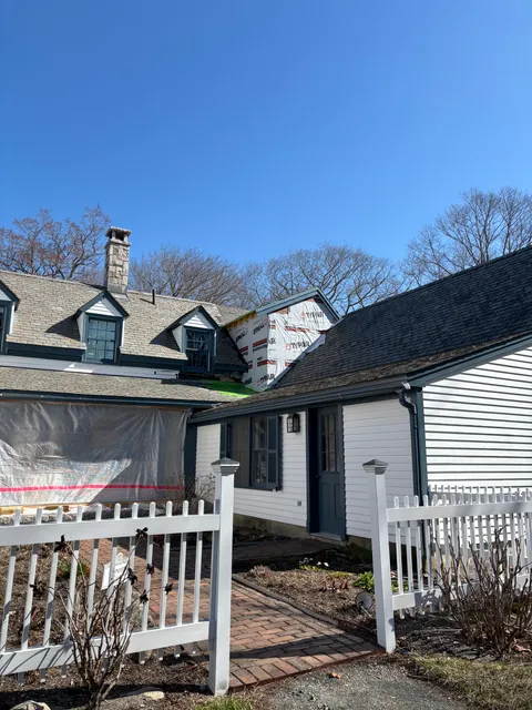 Full home renovation with slate roofing in progress
