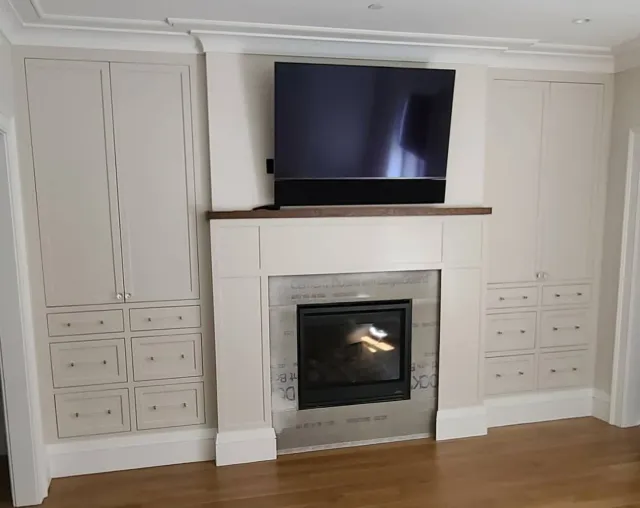 A room with a desk and a chair in it