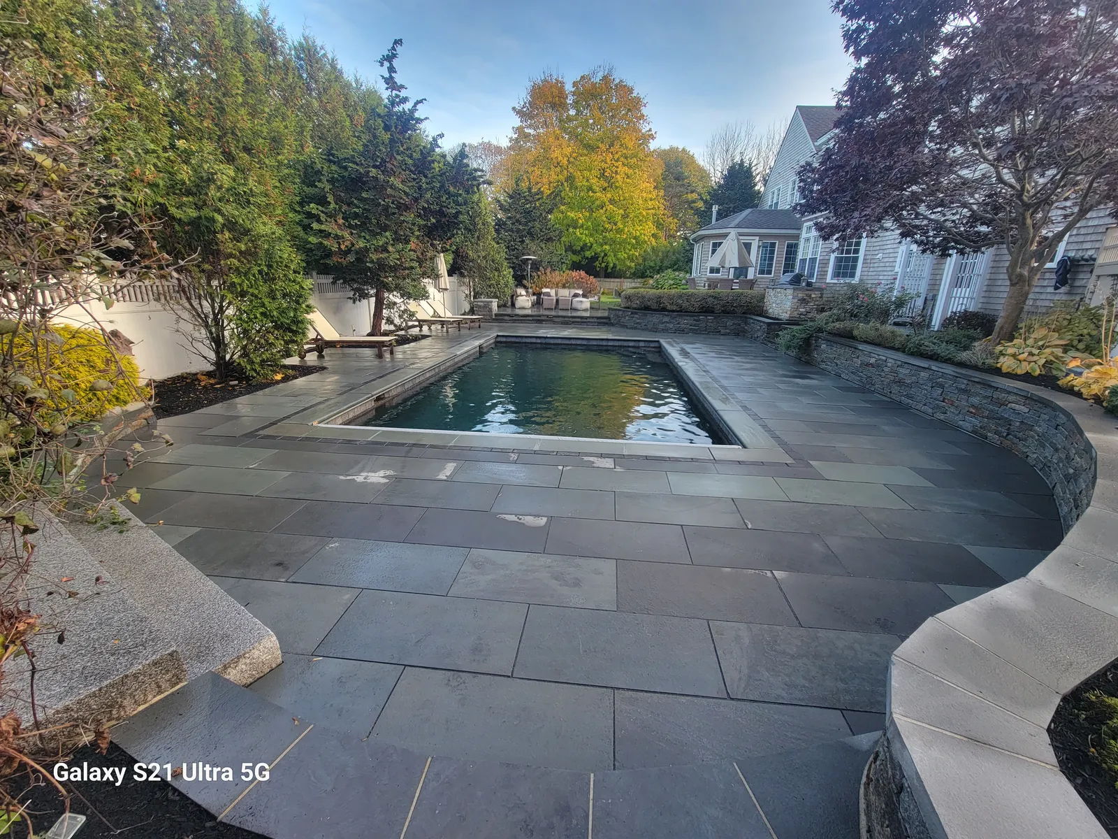 Custom stone patio built by Stiles and Sons in NH Seacoast