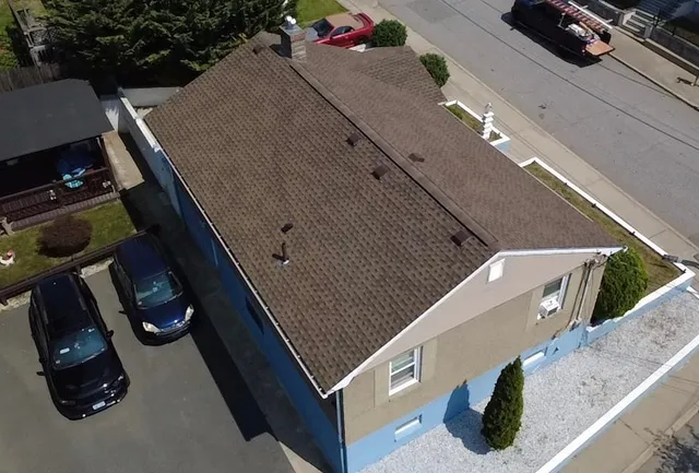 Completed brown shingle roof