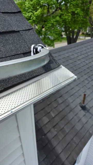 Screening fitted to a curved roofline — Nature Guard Gutters, Biddeford ME