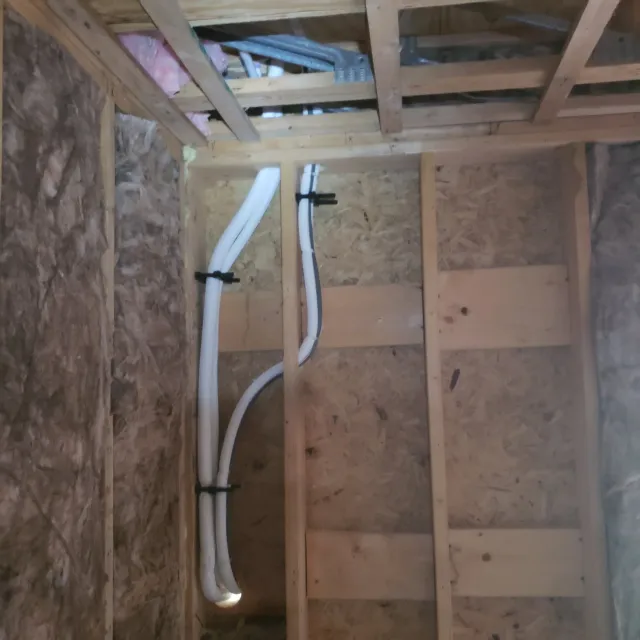 Line sets, wire, and drains ran in the wall