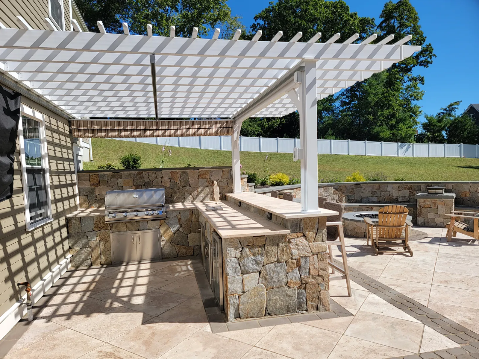 Custom stone patio built by Stiles and Sons in NH Seacoast