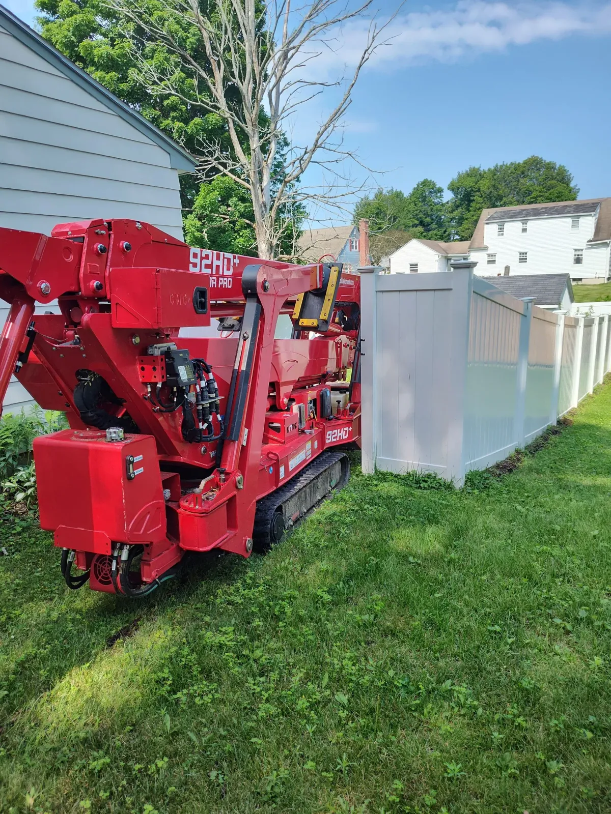 Land clearing with red truck - Pittsfield, MA - Northern Oak Tree & Home Services