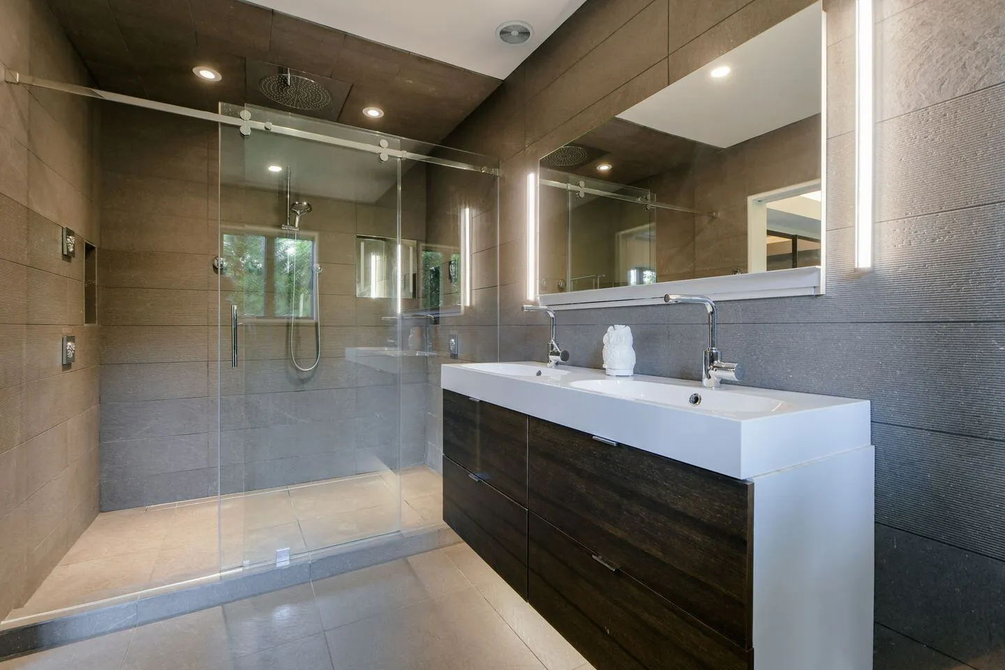 Master bath with double vanity and walk-in shower