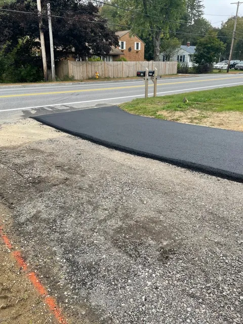 Asphalt driveway edge in southern Maine