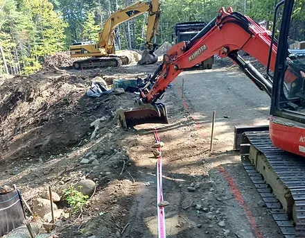 Excavation to prepare for installation of residential underground electric and water line