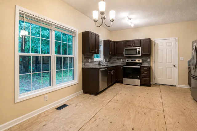 Kitchen vinyl flooring before