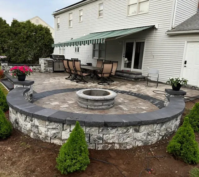 Custom stone barbecue grill built by Shkembi Masonry in Connecticut
