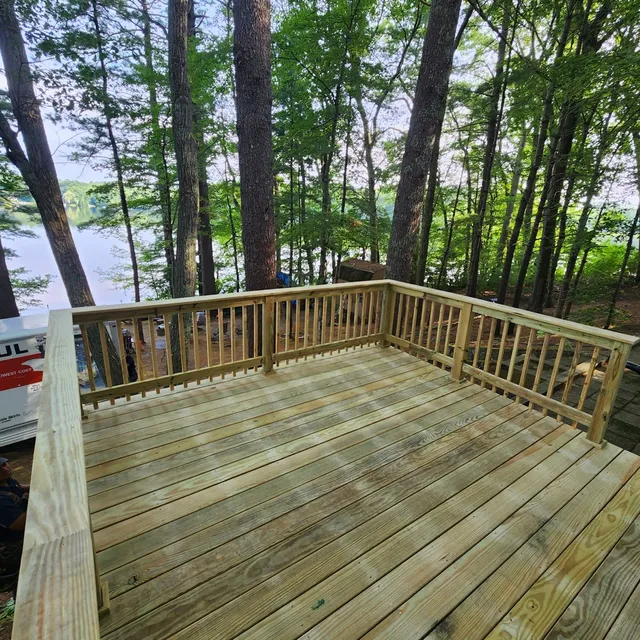 New pressure-treated deck with railing