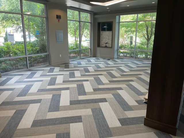 Shaw Contract reThink Woven LVT Collection. The gym area @ University Station Westwood MA. Excellent textured flooring  for any area. @shawcontract @gablesuniversitystation
