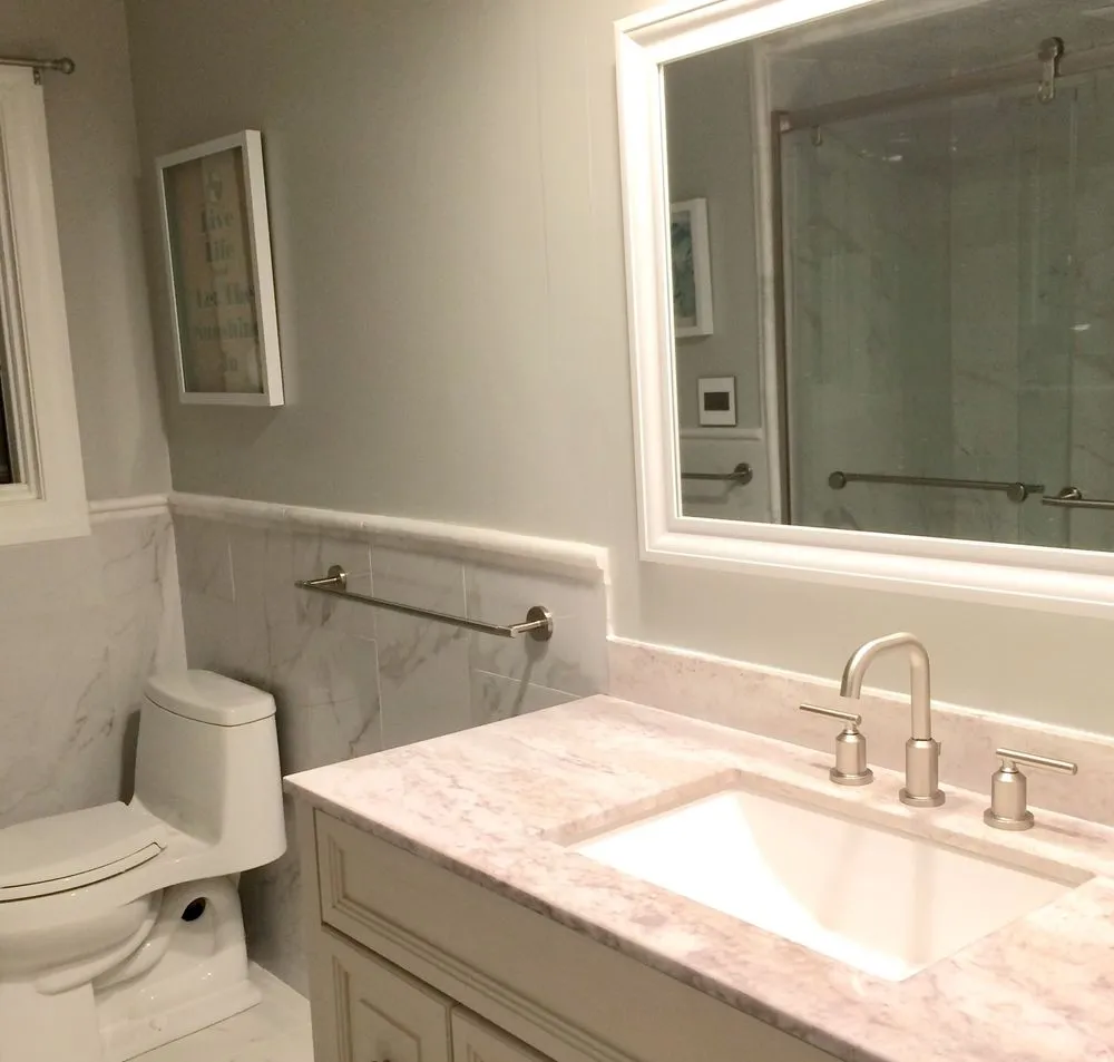 Bathroom remodel: marble vanity and glass shower