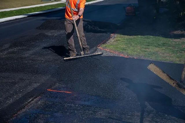 Worker Asphalt Paving | Asphalt Paving RI | Beausoleil & Sons Inc. | Paving Services Rhode Island