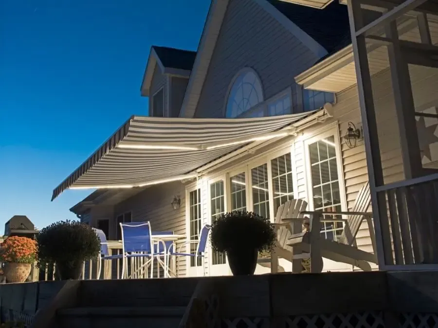 SunPro Motorized Retractable Awnings over a deck of a customer's backyard
