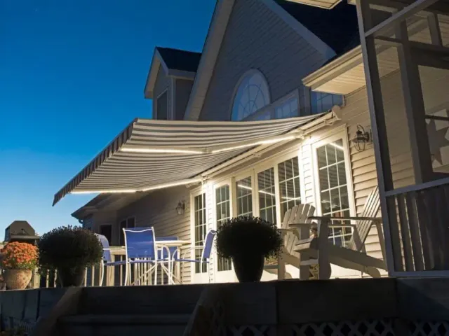 SunPro Motorized Retractable Awnings over a deck of a customer's backyard