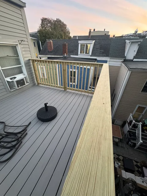 Completed deck renovation with new composite decking and railing system