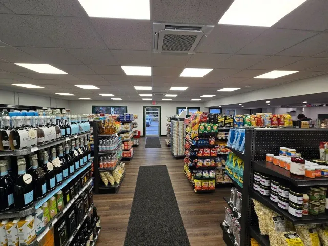 The inside of a grocery store filled with lots of products.