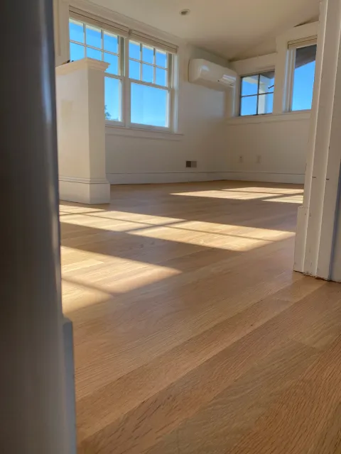 Newly finished white oak floor in sunlight