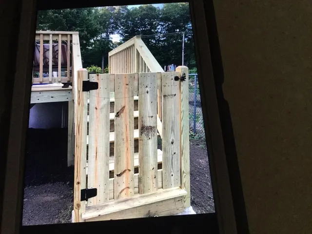 Deck framing and railing under construction