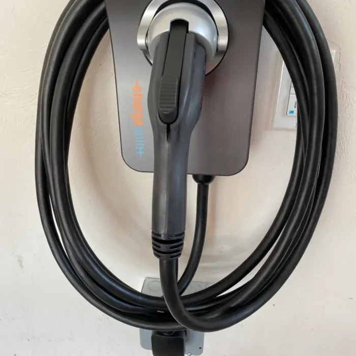 ChargePoint EV charger installed on an interior wall