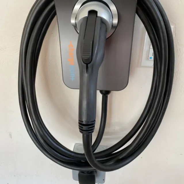 ChargePoint EV charger installed on an interior wall