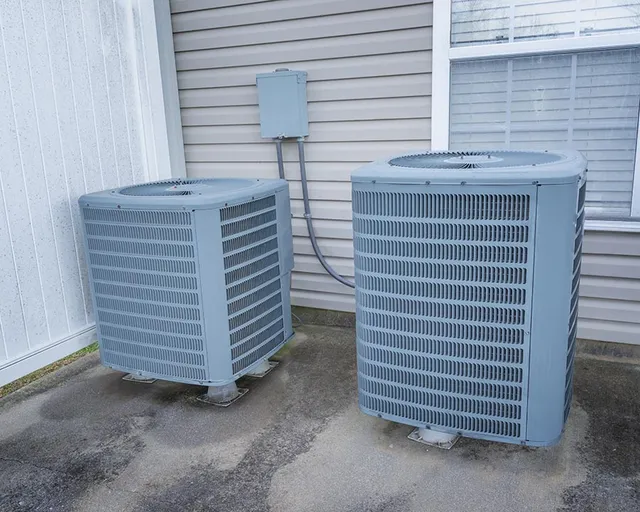 Horizontal Shot Of Two Air Conditioning Units