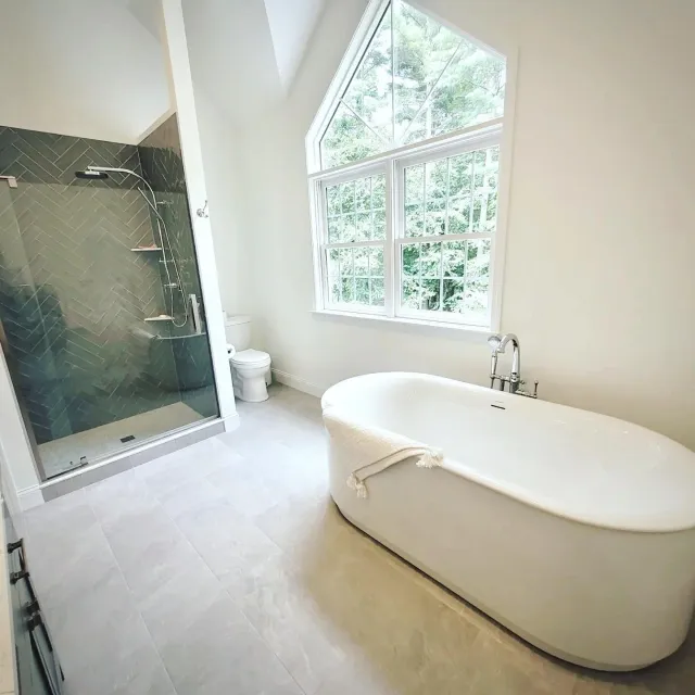 End of summer master bathroom remodel in Groton! As with most of the houses in this area built in the 90s, there was an impractical Jacuzzi tub that we ripped out. We also did a new vanity, new shower stall, new floor tile, paint, and a nice, big, fr
