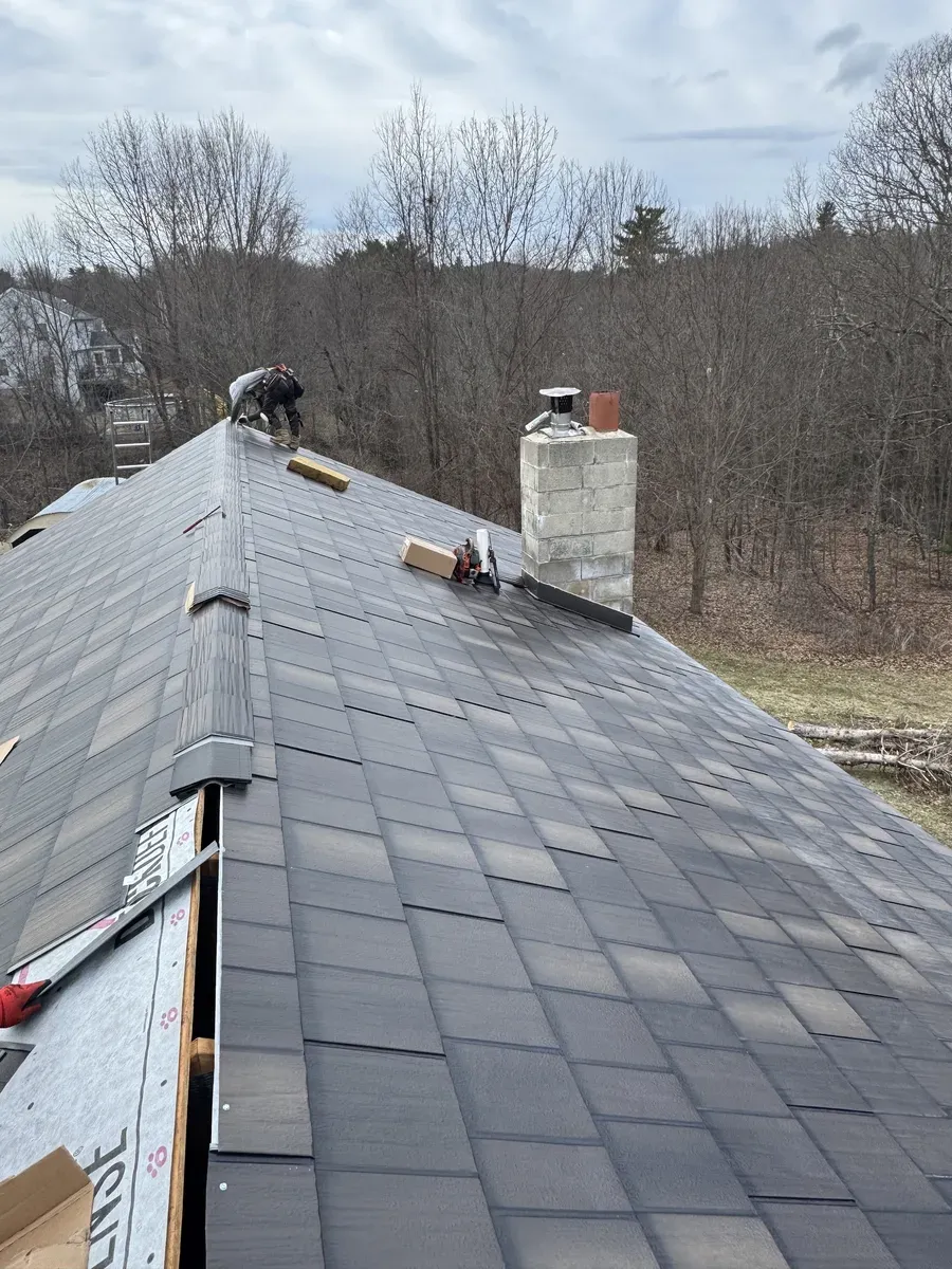 Close-up of a new gray architectural shingle roof installation by Joe's Roofing
