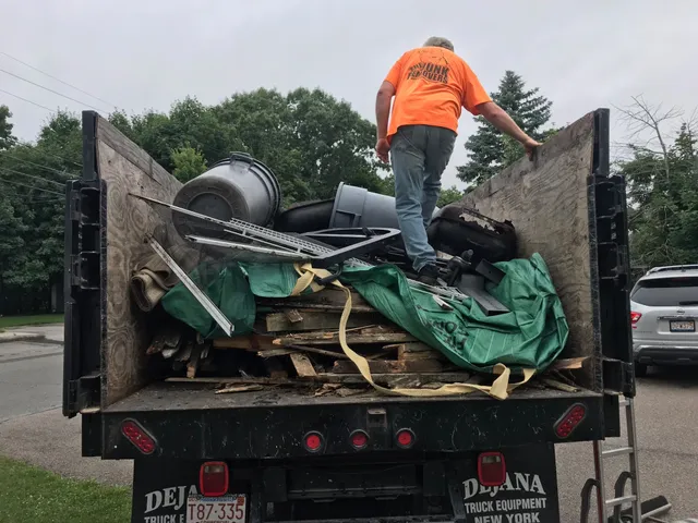 Truck loaded with junk and debris