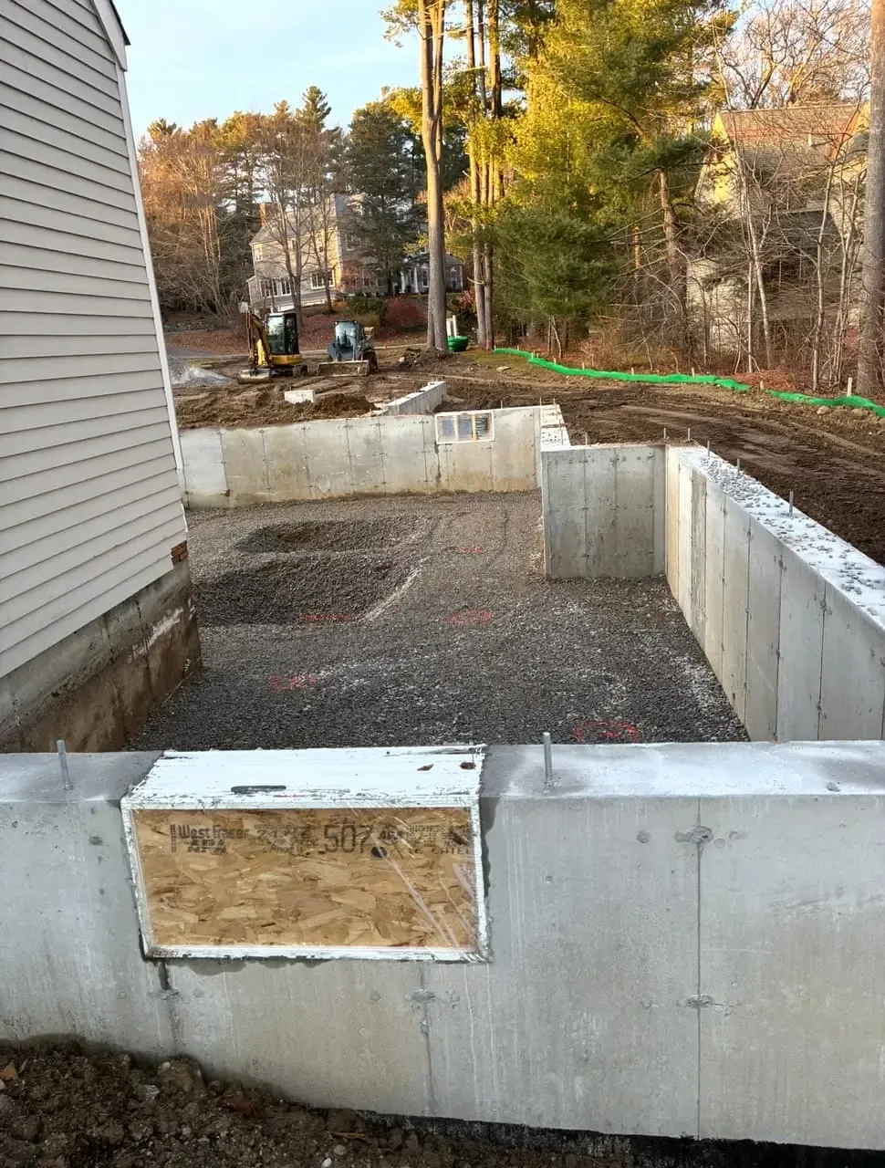 Legacy Excavation is an excavation company that provides laser-graded pads and slab prep in Plymouth, MA