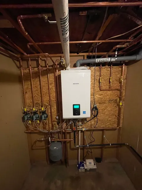 Navien tankless combi boiler with new copper near-boiler piping
