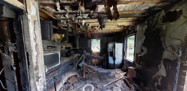 Fire damaged room after total loss