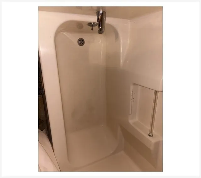 After: Bathtub before and after cleaning
