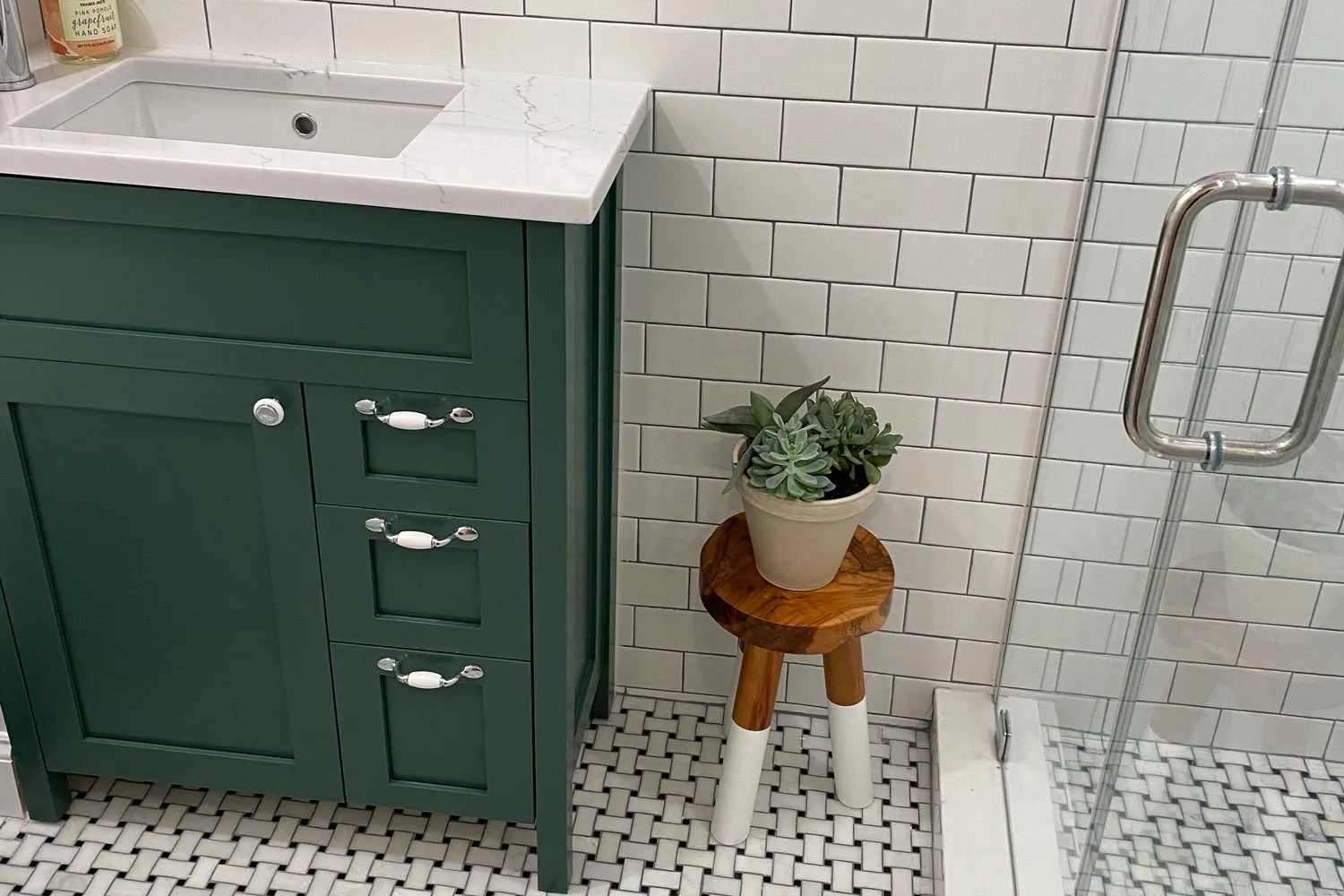 Custom green painted birch bathroom vanity