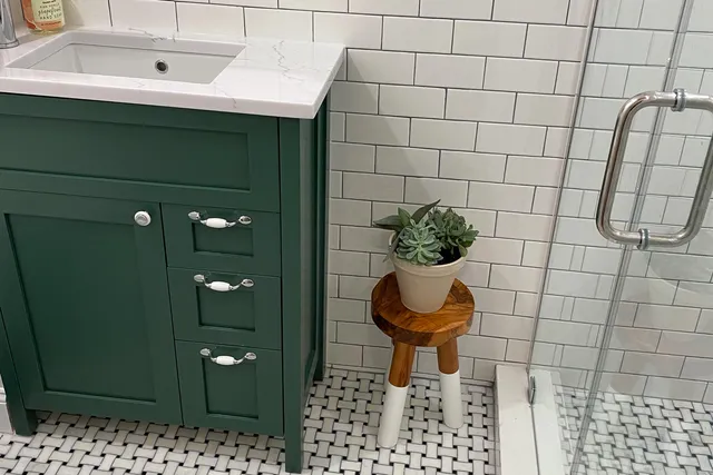 Custom green painted birch bathroom vanity