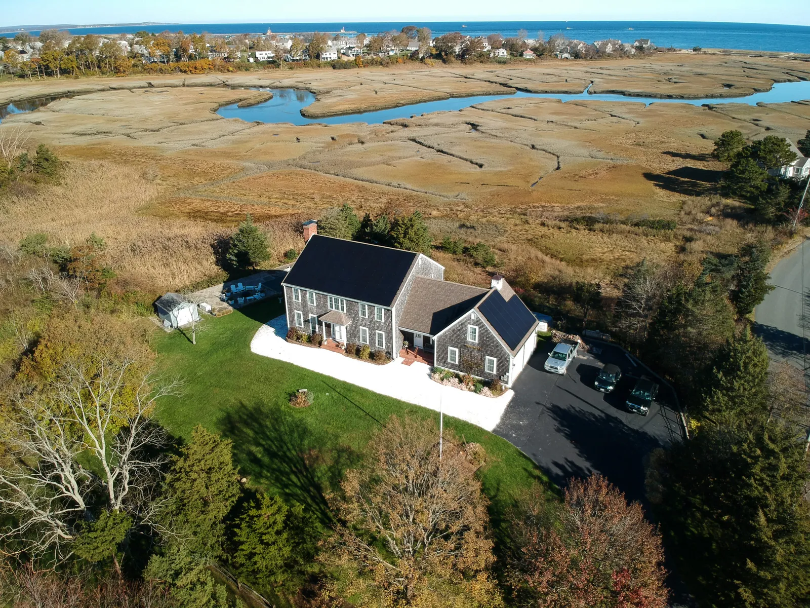 Birds eye view of a home with solar panels installed on the roof